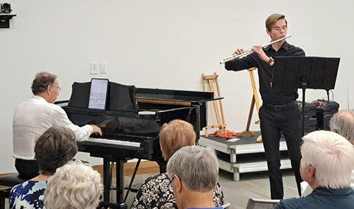 Cole Laudenslager on flute, accompanied by Haig Yaghoobian